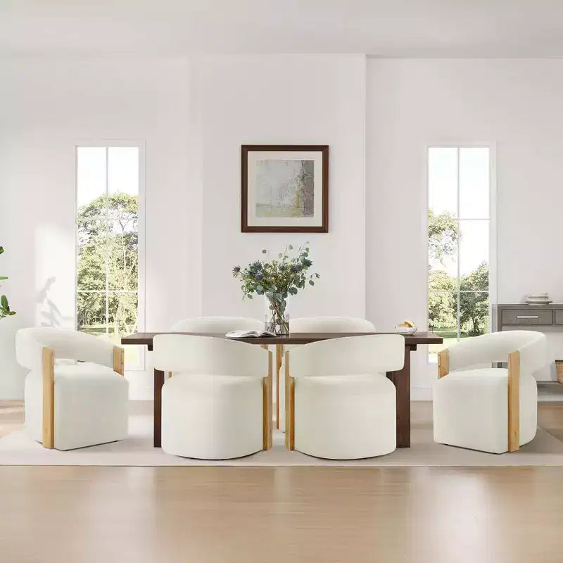 Sedia da pranzo imbottita con braccioli in legno e ruote a scomparsa